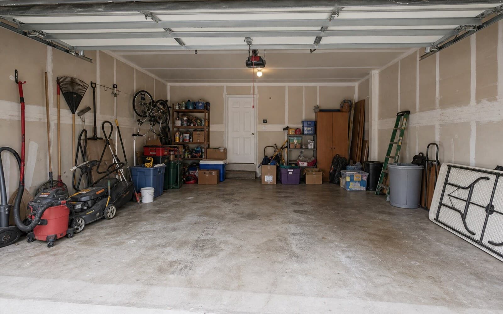 Garage cluttered garage -> organized storage sample transformation — before