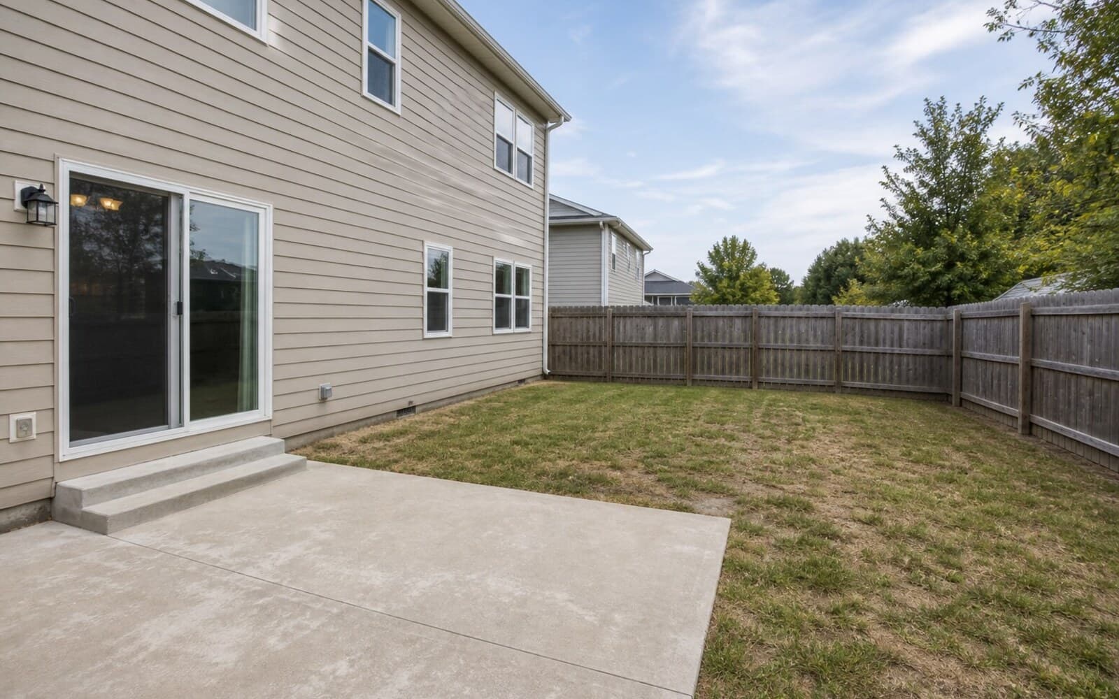 Backyard bare backyard -> entertaining-ready sample transformation — before